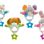 The baby is chewing a rattle, Unikatoy